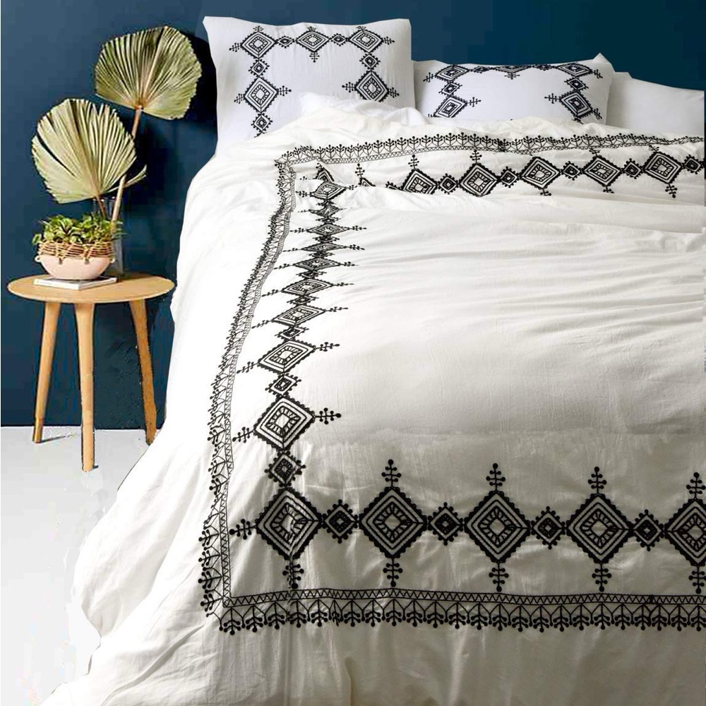 White duvet cover with navy blue embroidery geometric inspired